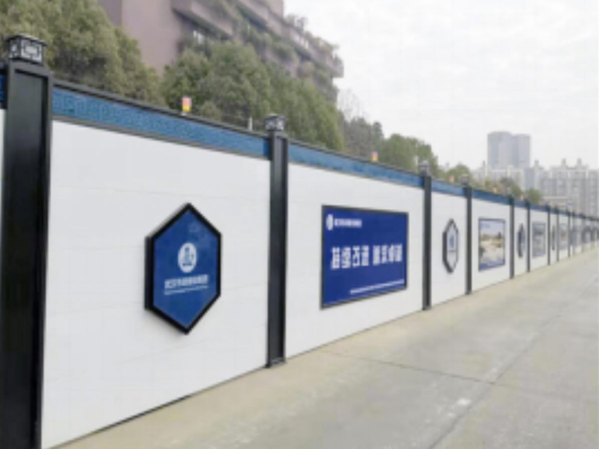 Municipal Hoarding — Galvanised post and two-band panel face of a municipal hoarding
