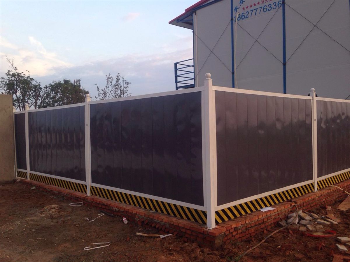PVC hoarding with a coloured PVC panel face and PVC post shells around a works area